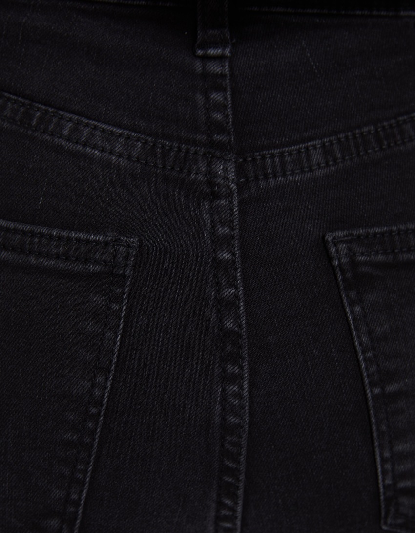 Calça jeans skinny de cintura super alta e rasgada
