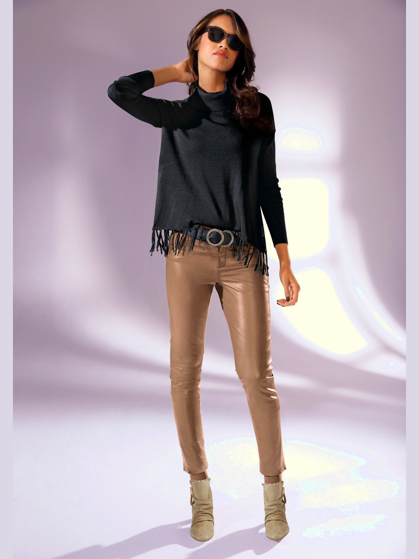 Pull col roulé style poncho tendance avec franges