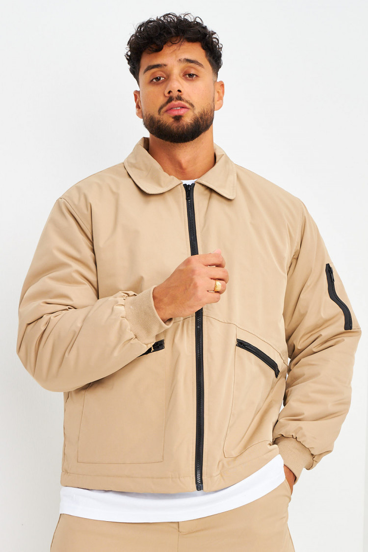Blouson beige foncé à poches zippées