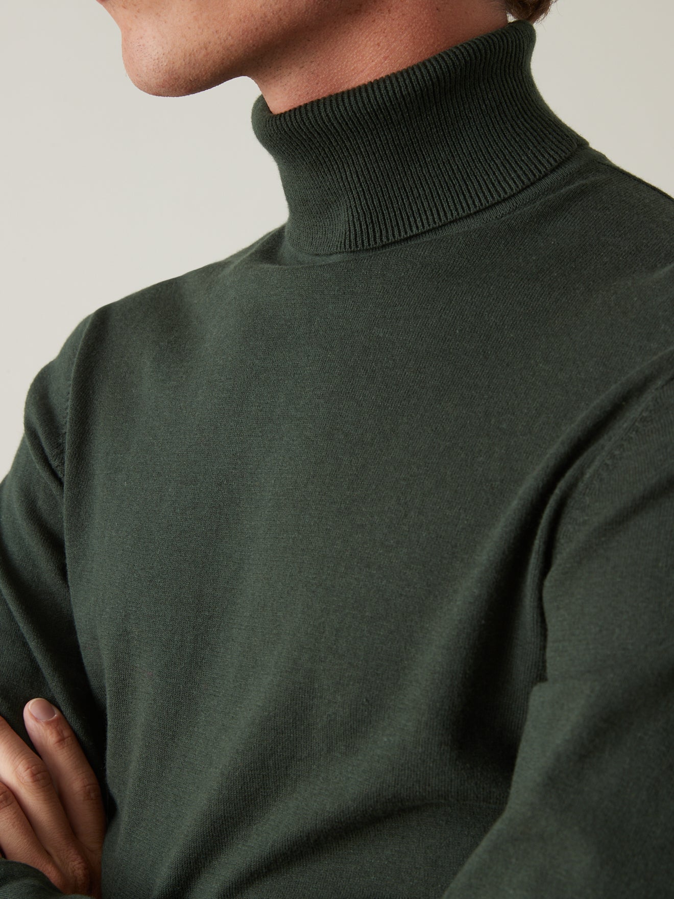 Pull col roulé homme