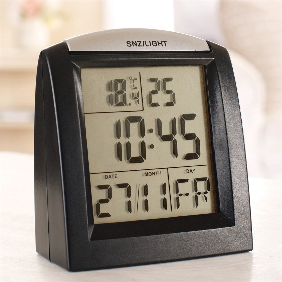 Reveil compact radio piloté