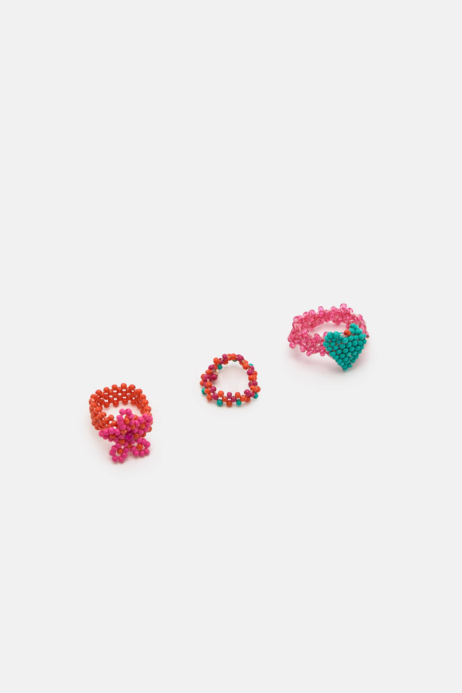 Conjunto de 3 anéis com miçangas - fúcsia