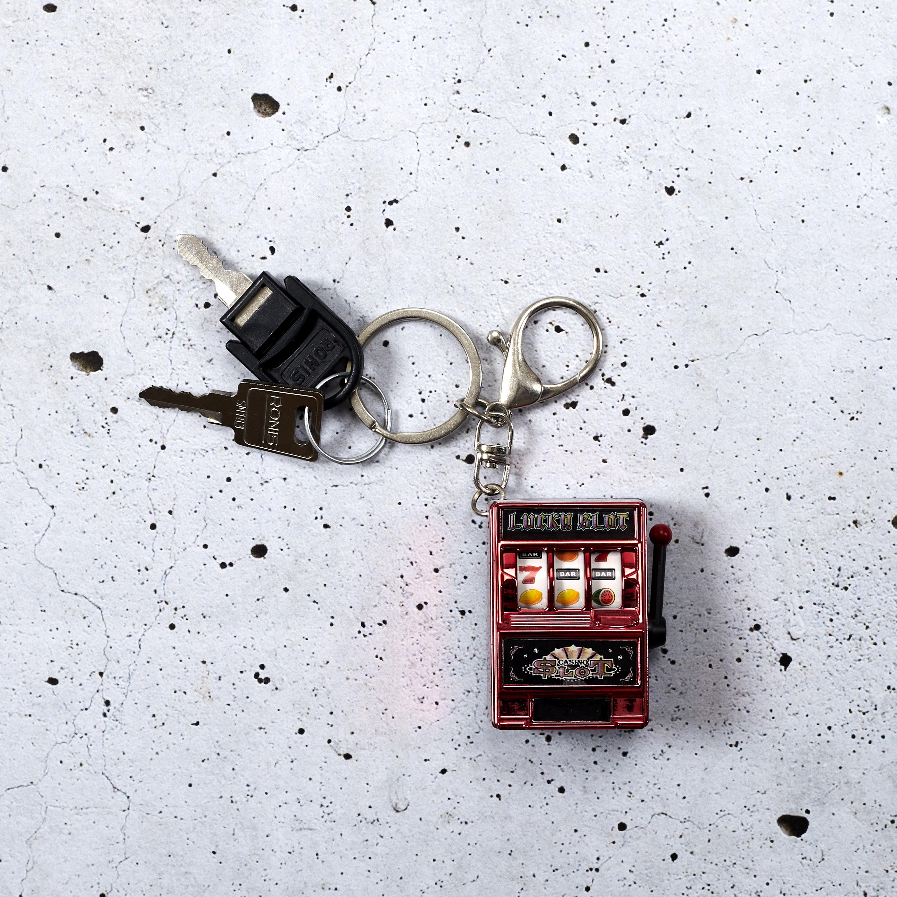 PORTE CLES MACHINE A SOUS