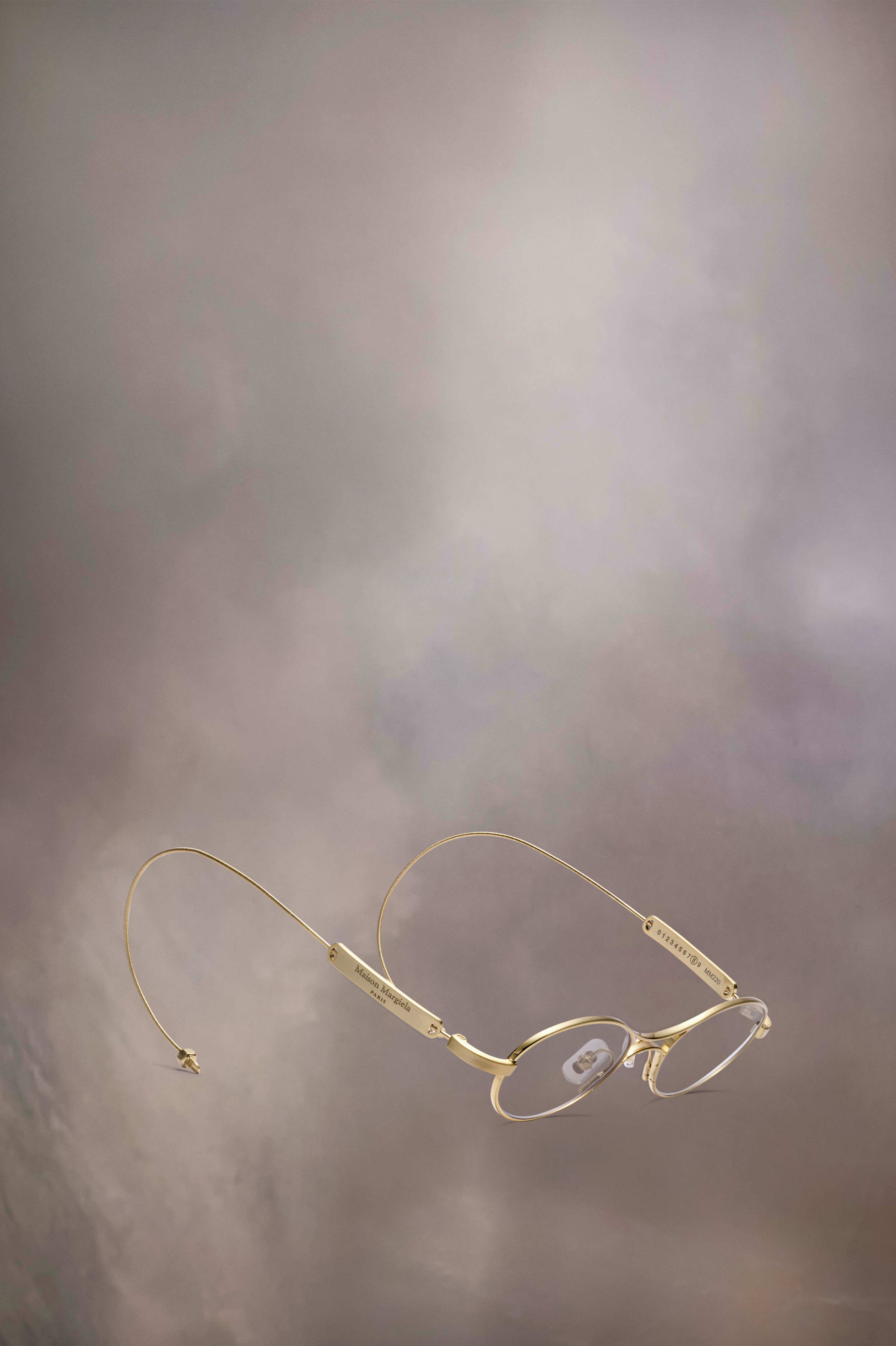 Lunettes ovales dorées x Gentle Monster​