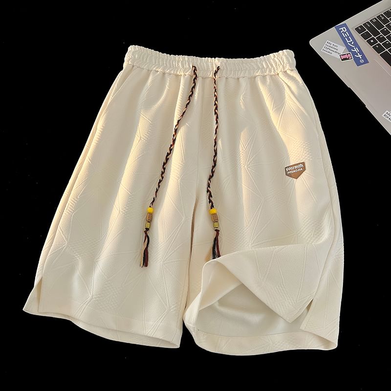 Derbundy - Trekkoord taille letters applicatie split sweat shorts