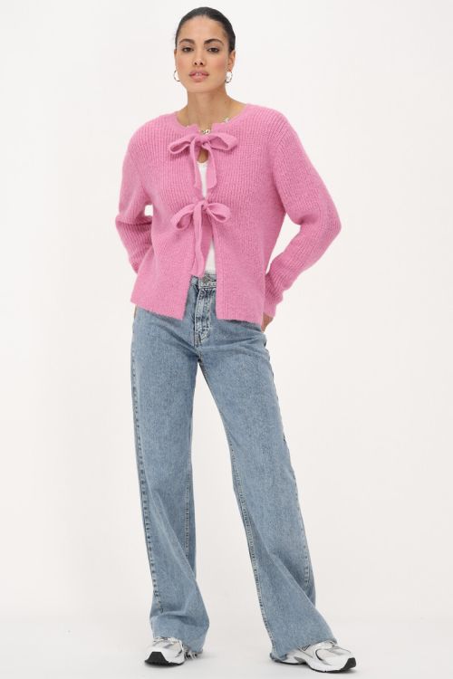 Roze gebreide trui met strikken