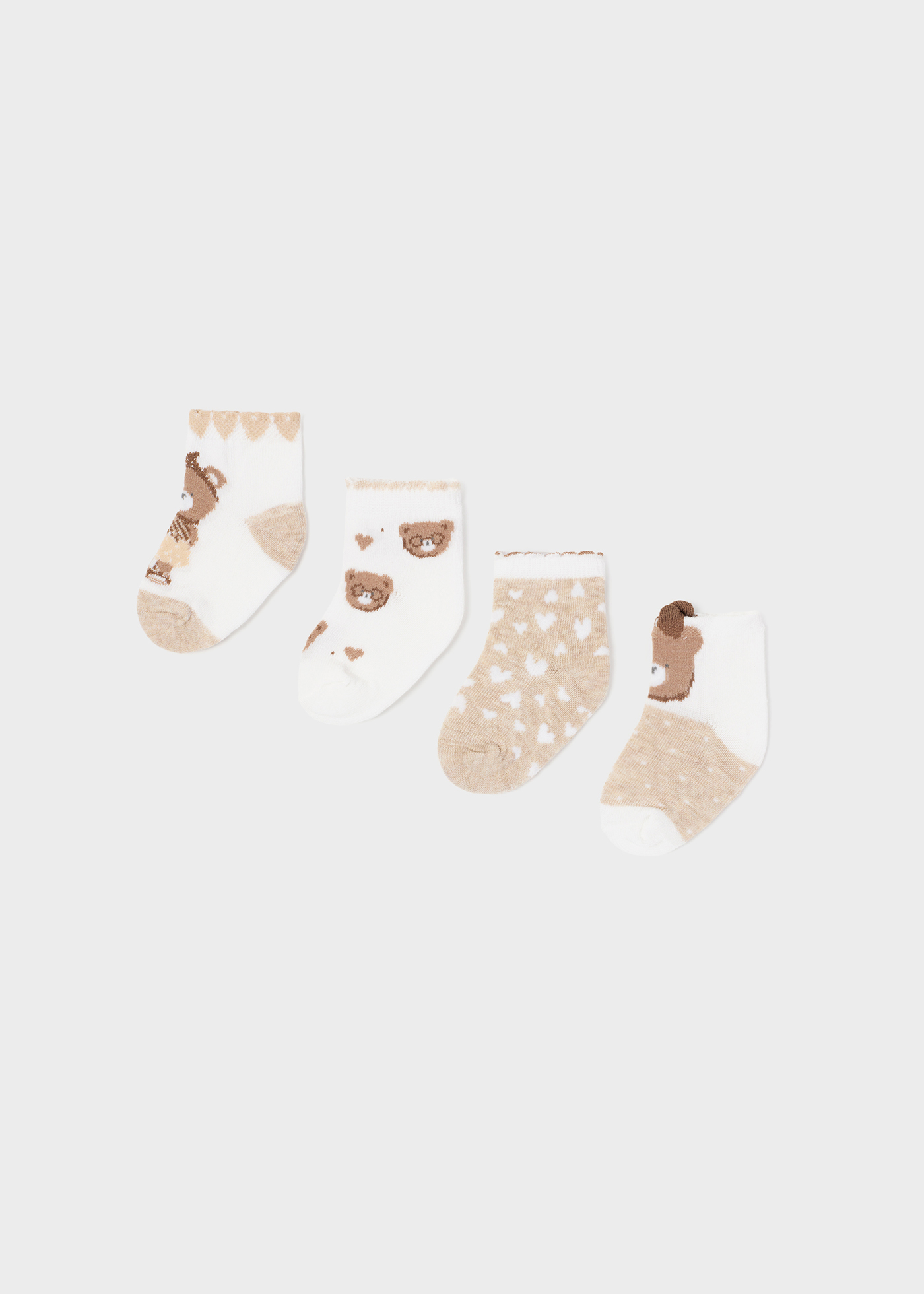 Pacote com 4 pares de meias de algodão orgânico para recém-nascidos.