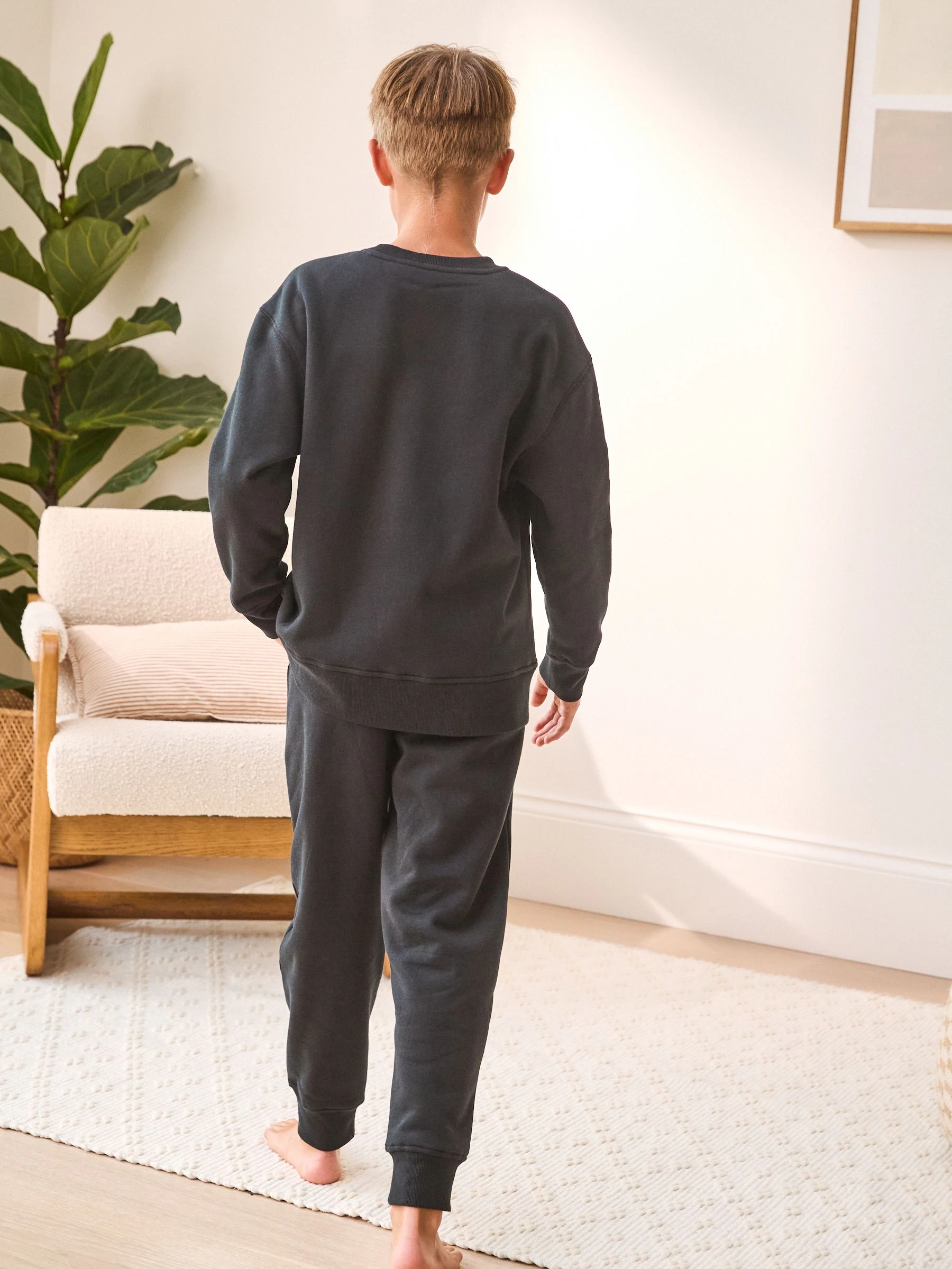 Zwart - Enkele behaaglijke fleece pyjama (3 - 16 jr)