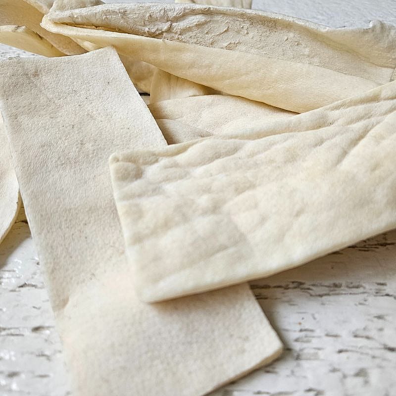 Wit Buffelhuid Chips Dierenartsenpraktijk Horst 200 gram zakje