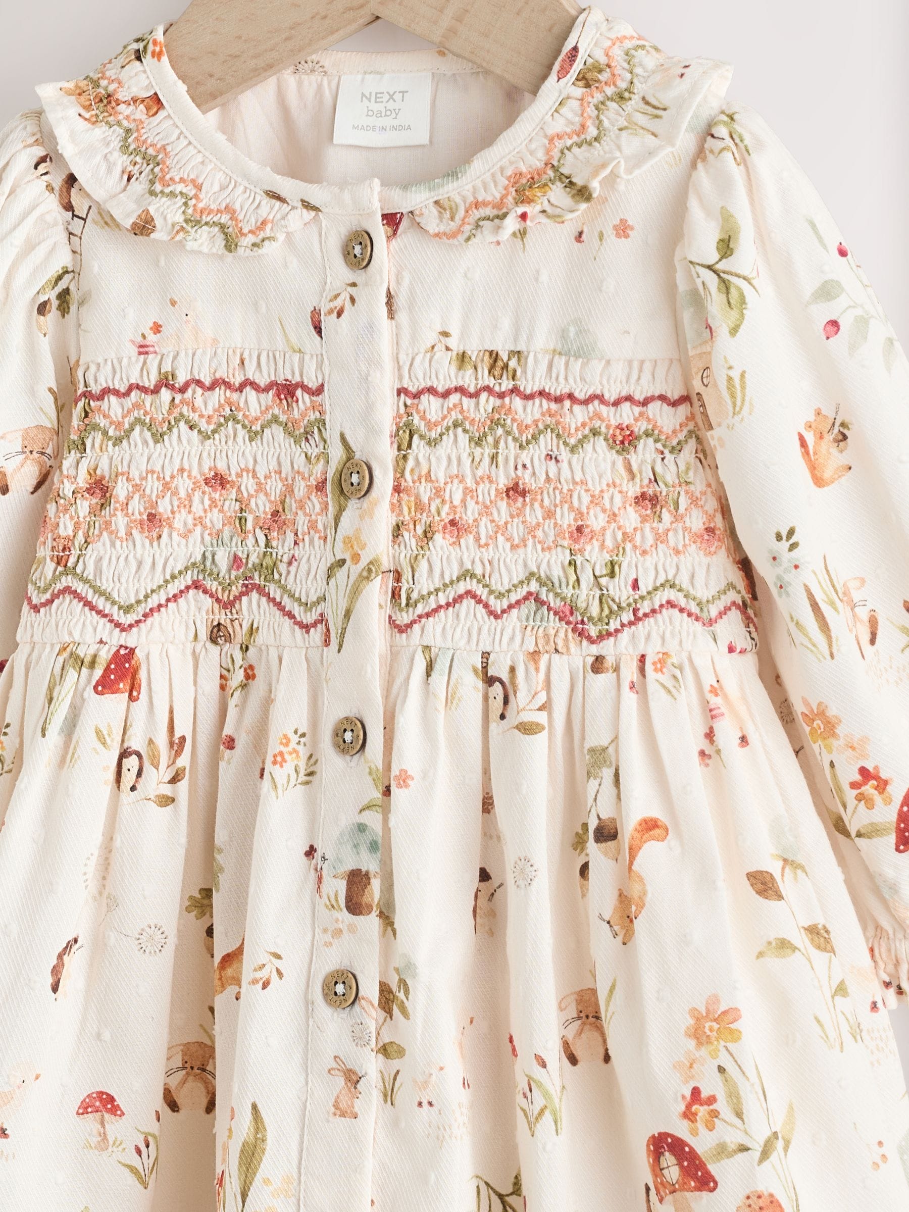 Crème bloemenprint/personage - Collar Baby Dress (0mths-2yrs)