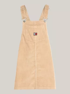 Vestido jardineira de veludo cotelê com emblema