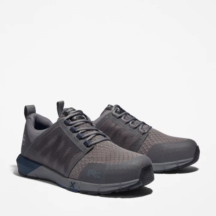 Sapato de trabalho masculino Radius com biqueira de liga metálica nas cores cinza e azul.
