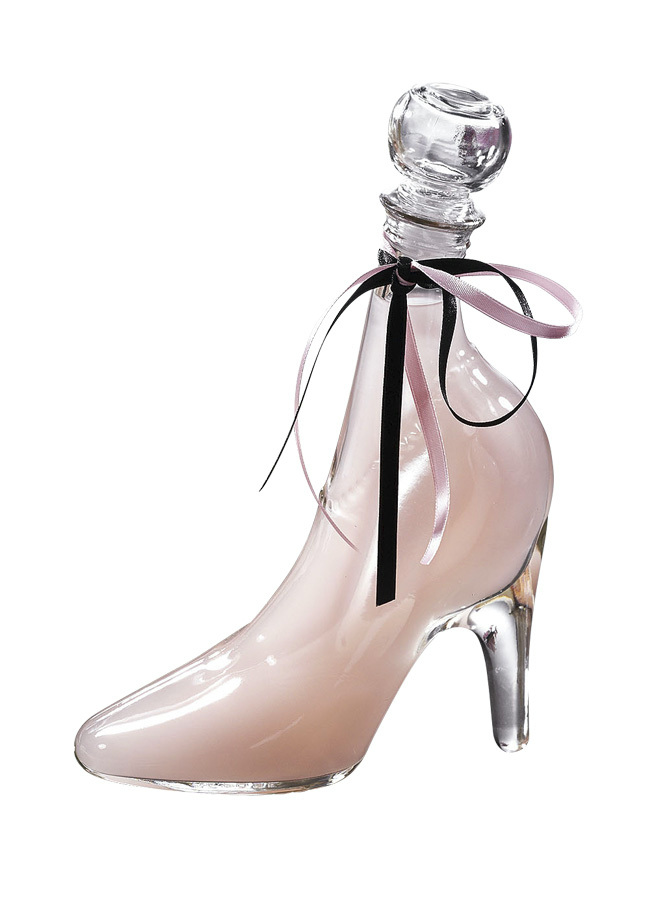 Badeschaum in gläsernen Pumps