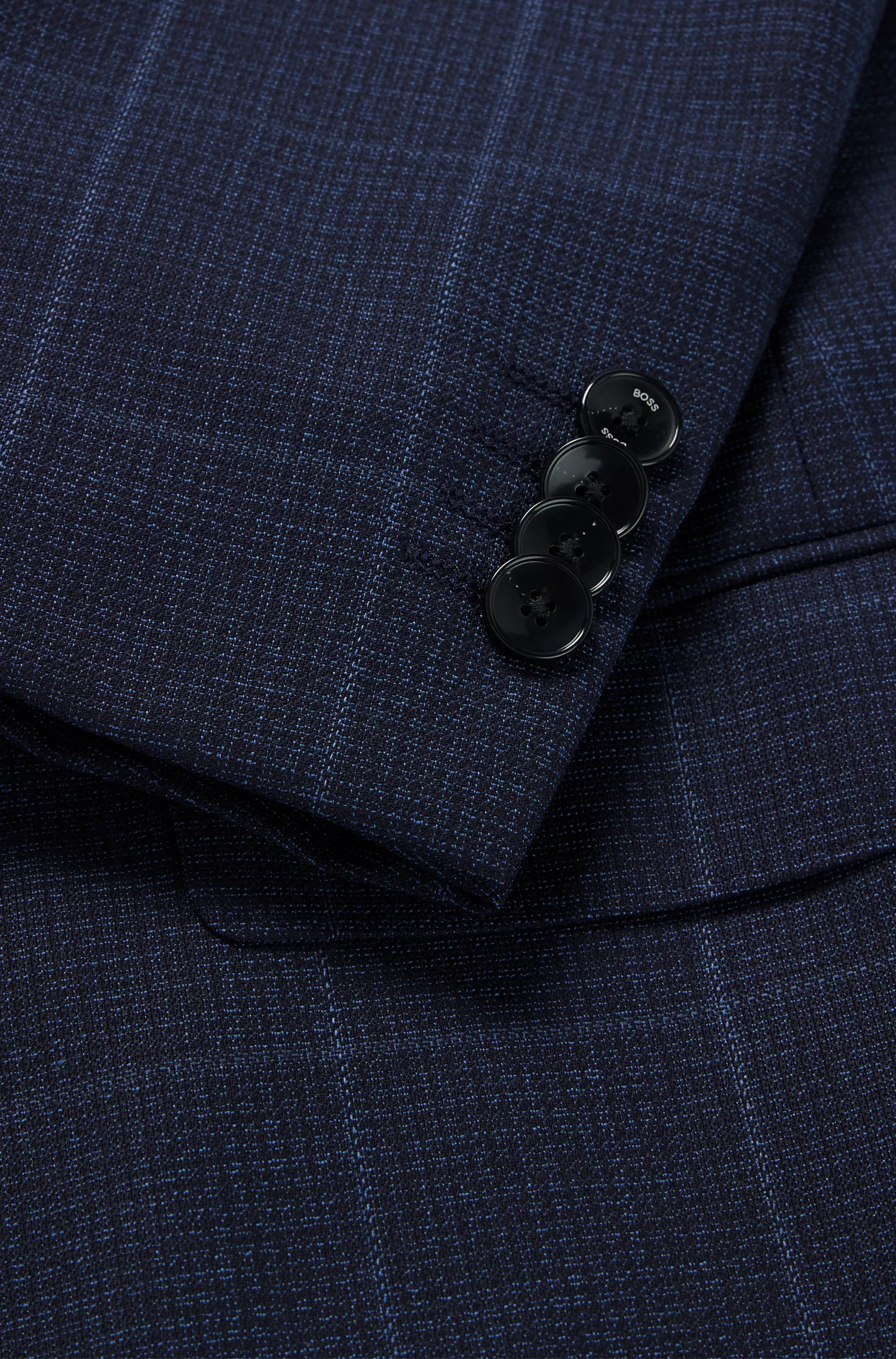 Terno BOSS preto de três peças, extra slim fit, em lã virgem.