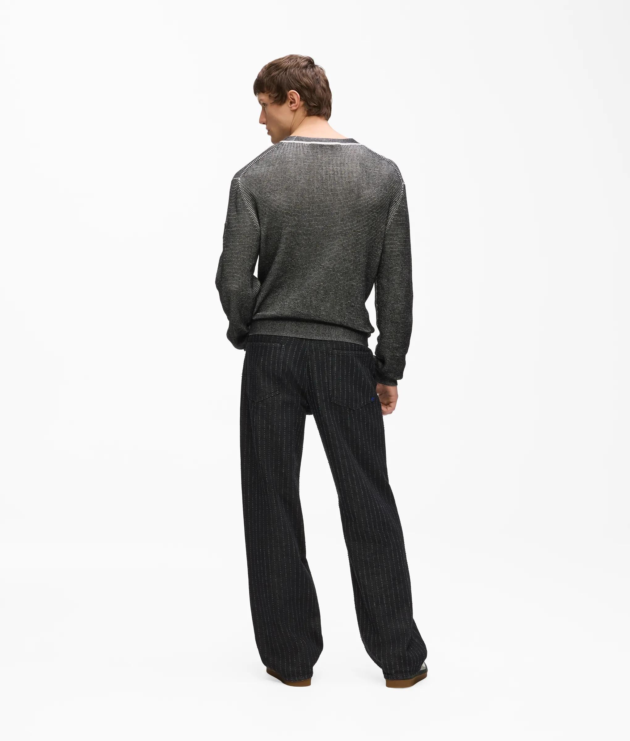 Blauwhongeruitlopende jeans met pinstroken