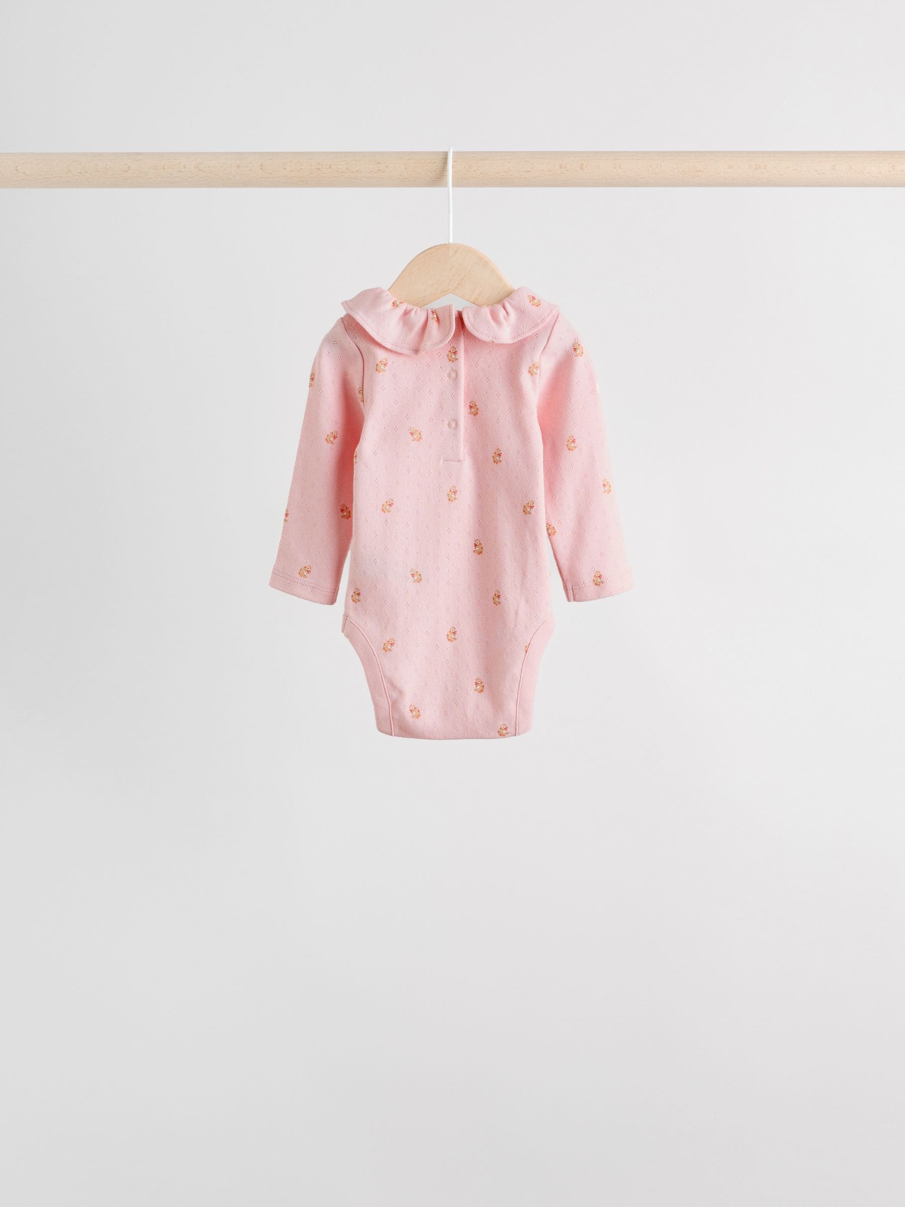 Roze/crème/bruin met fijne bloemetjesprint - Verpakking van 4 babyrompers met lange mouwen en ruches (0mnd-2jr)