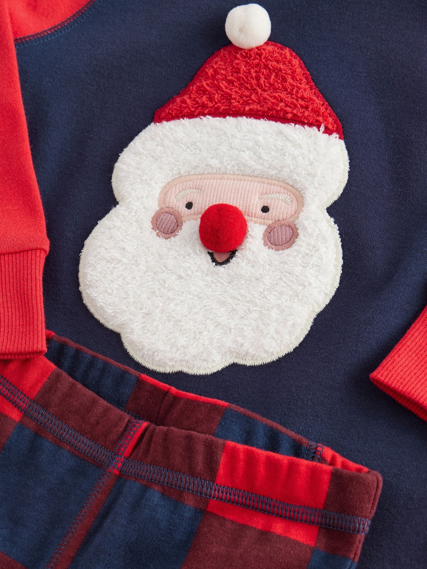 Marineblauw/rode kerstman met ruiten - 100% katoenen kerstpyjama (9 mnd - 12 jr)