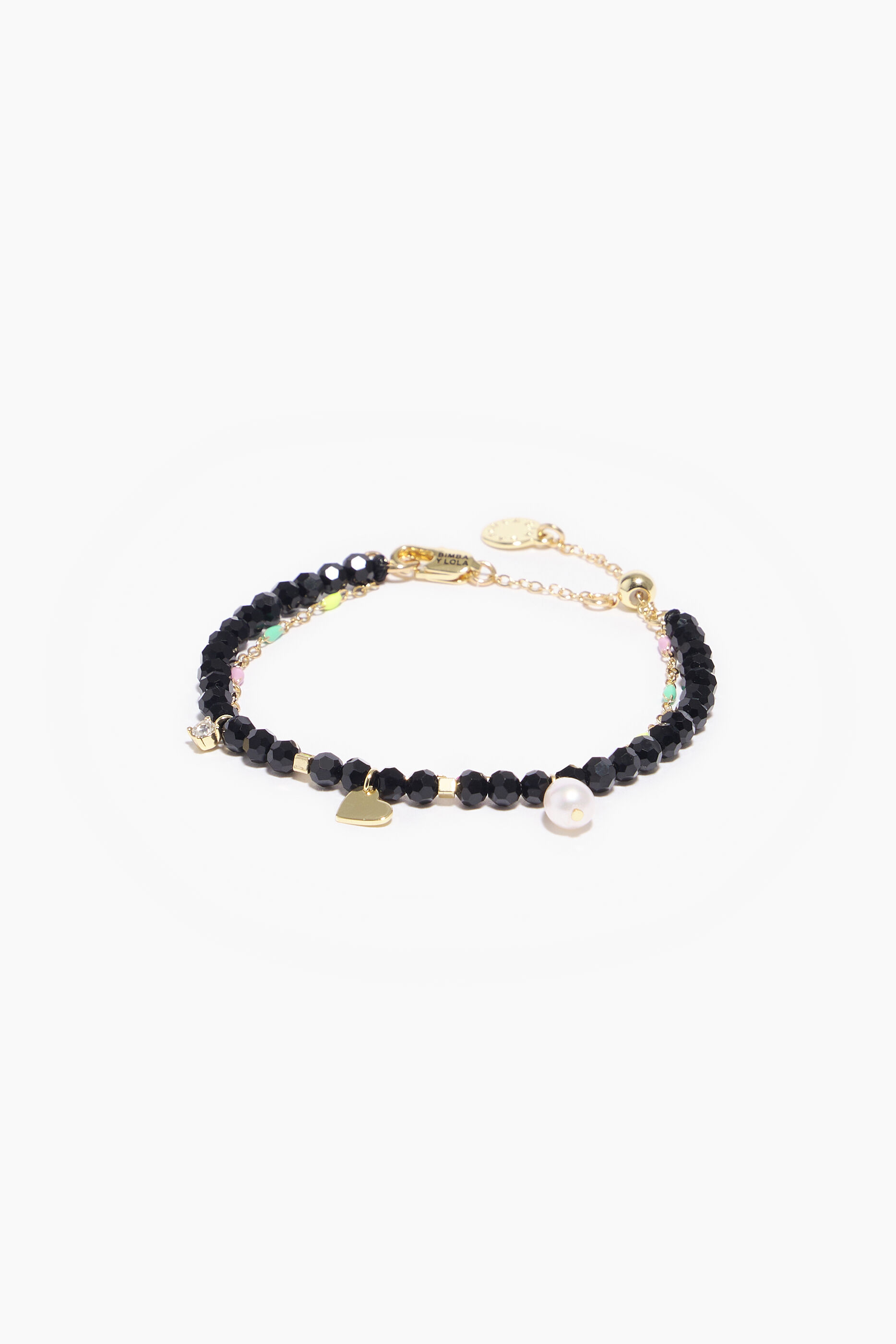 Pulseira com cristais facetados e corrente dourada.