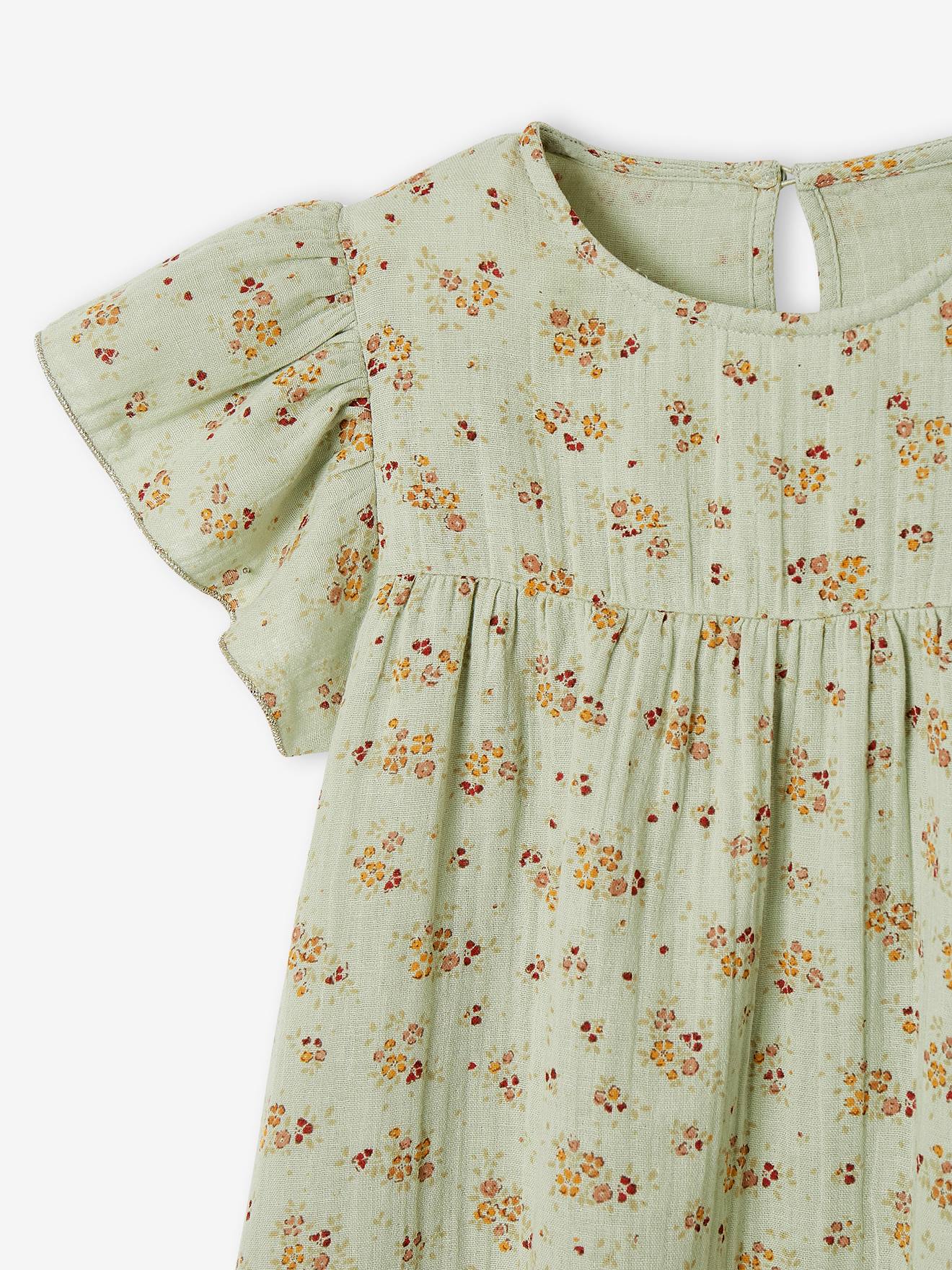 Vestido infantil de chiffon de algodão estampado com mangas borboleta, na cor verde-água.