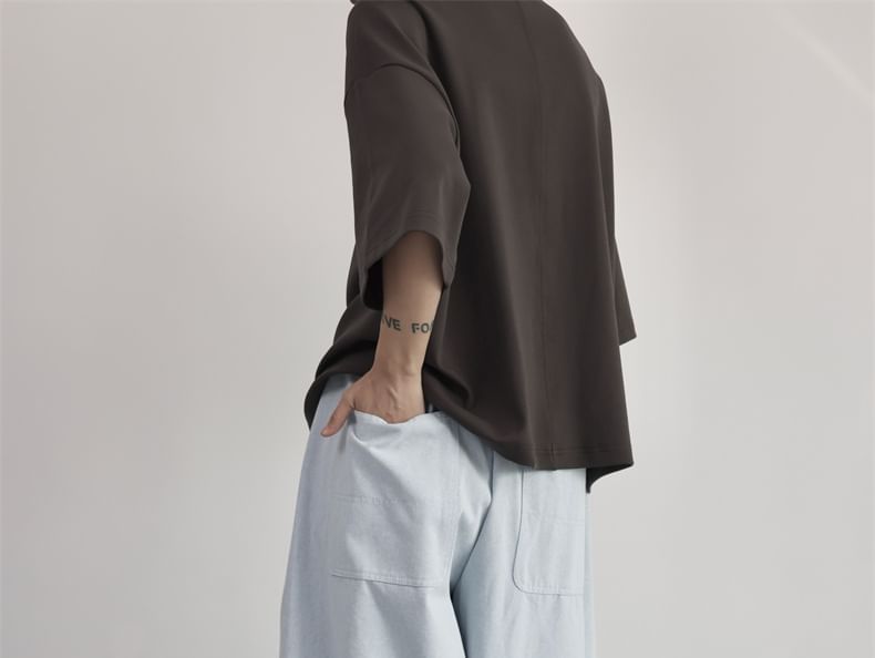 SIMPLE BLACK - Effen broek met elastische taille en wijde pijpen