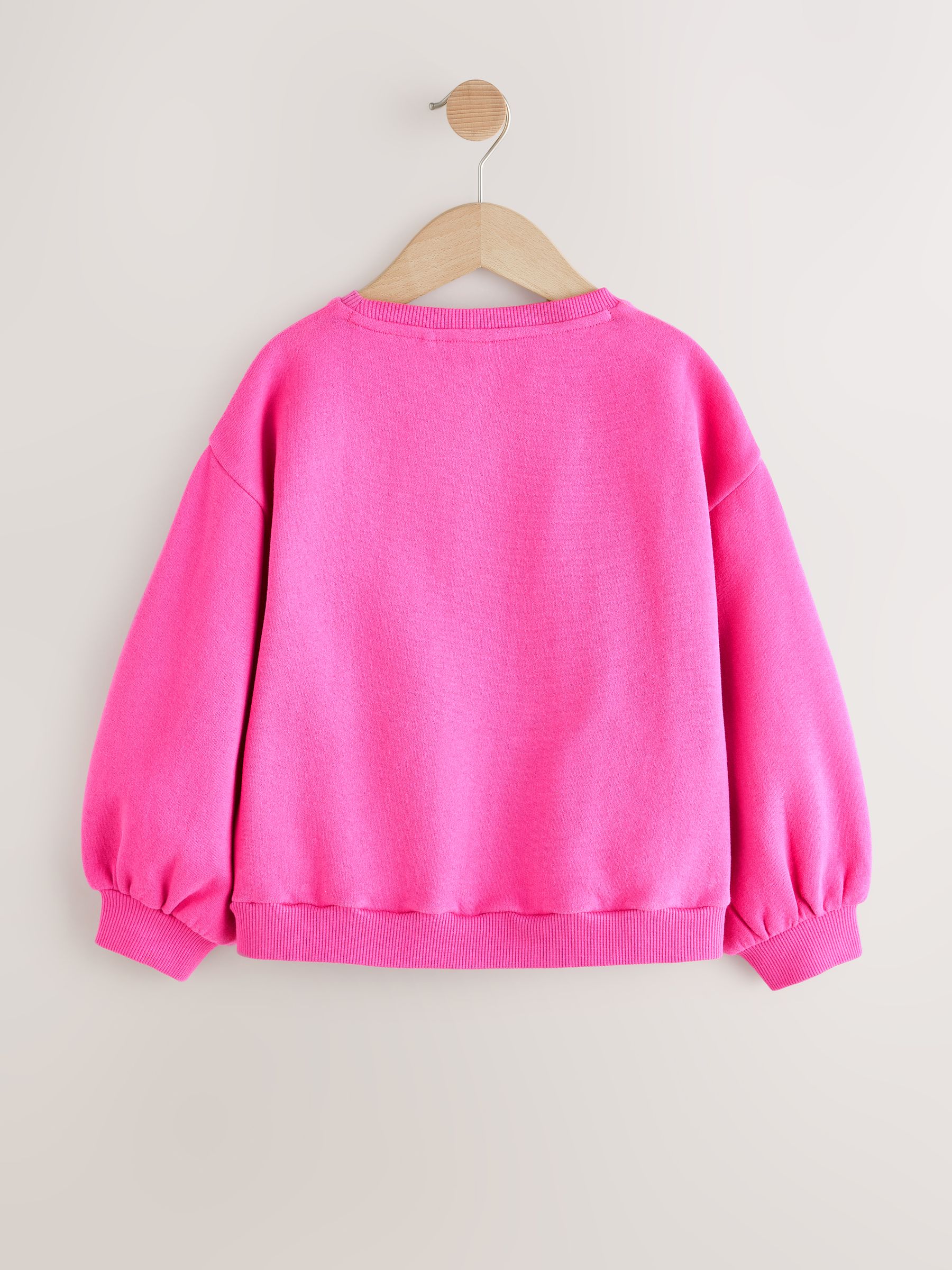 Felroze met lovertjesster - Sweatshirt (3 - 16 jr)