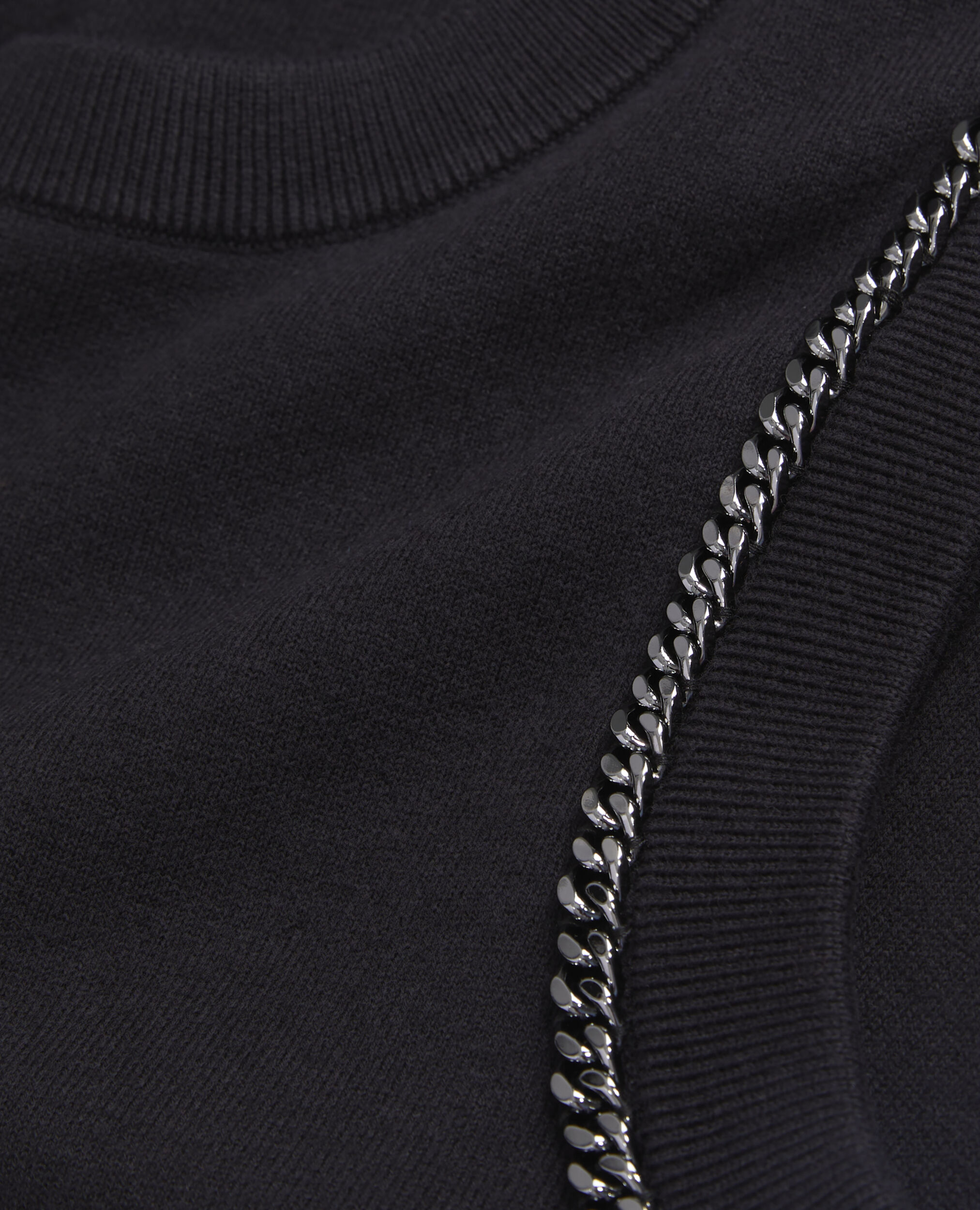 Black knit sweater with chains