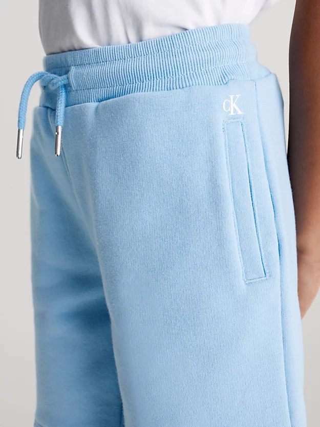 Shorts de moletom justos com logo da marca