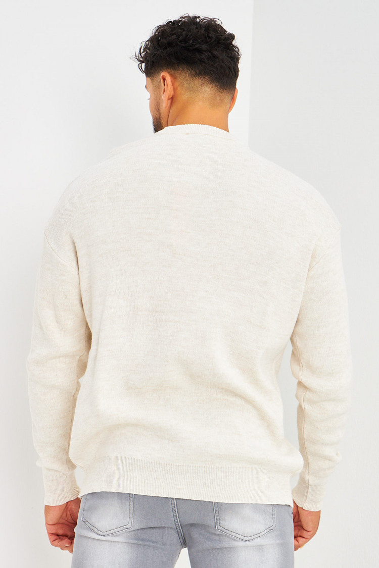 Pull beige en mailles fines