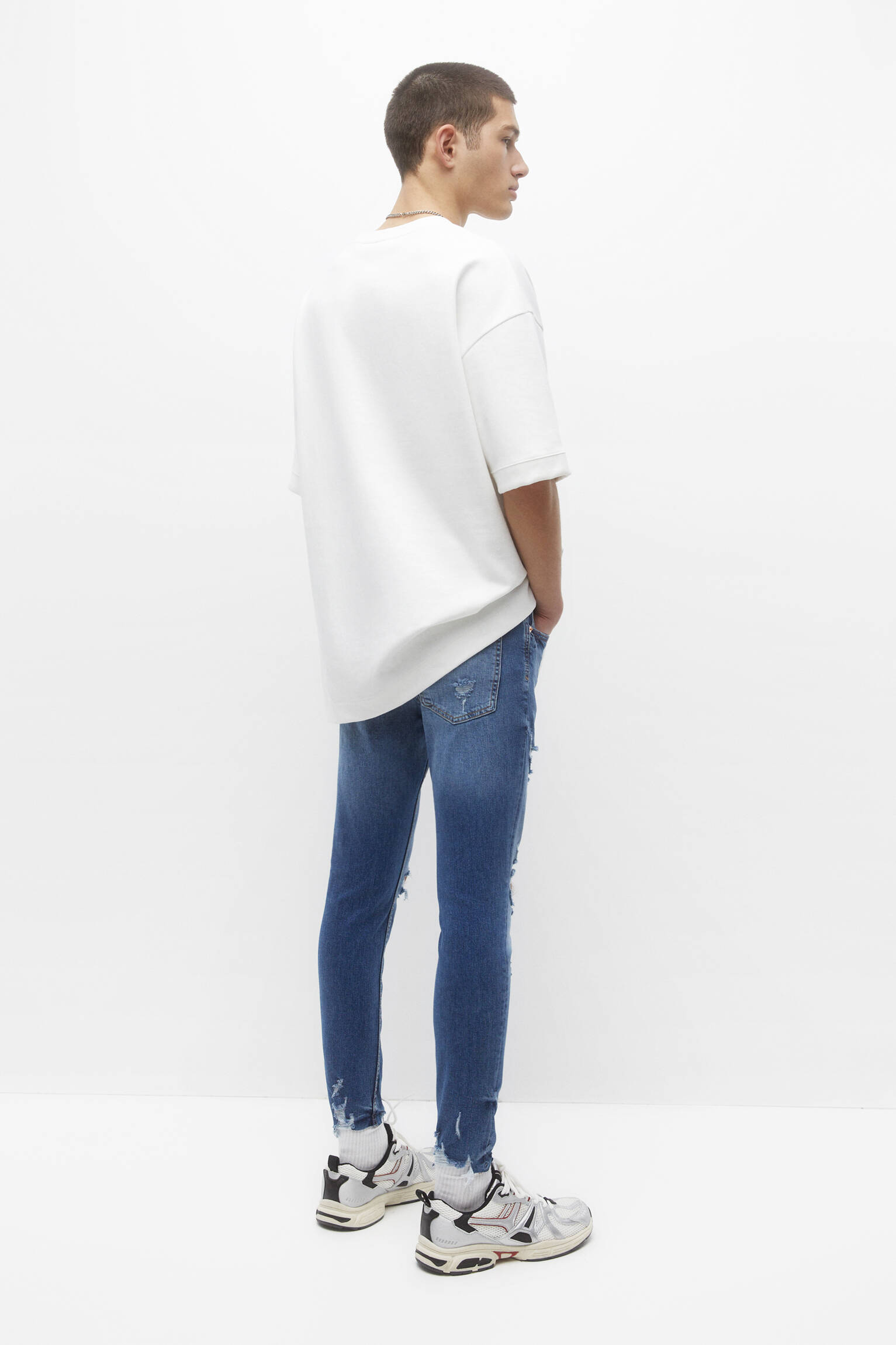 CALÇA JEANS SKINNY RASGADA - AZUL MÉDIO