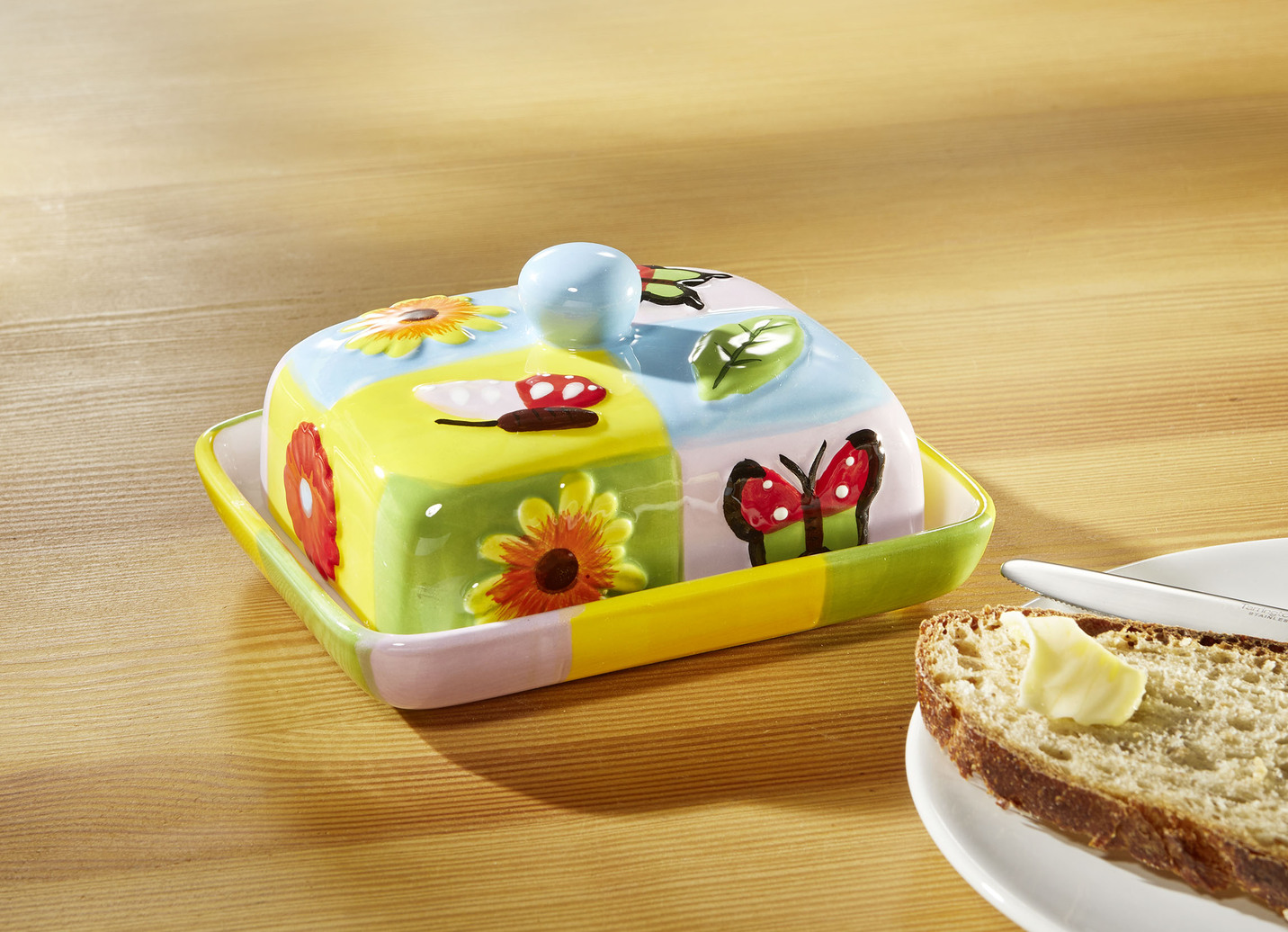 Farbenfrohe Butterdose aus Keramik