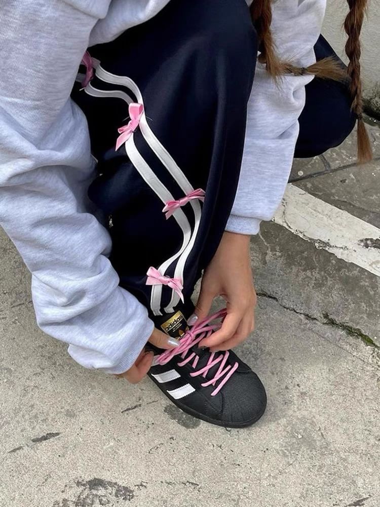 PINPI - Gestreepte baggy joggingbroek met trekkoord en strik