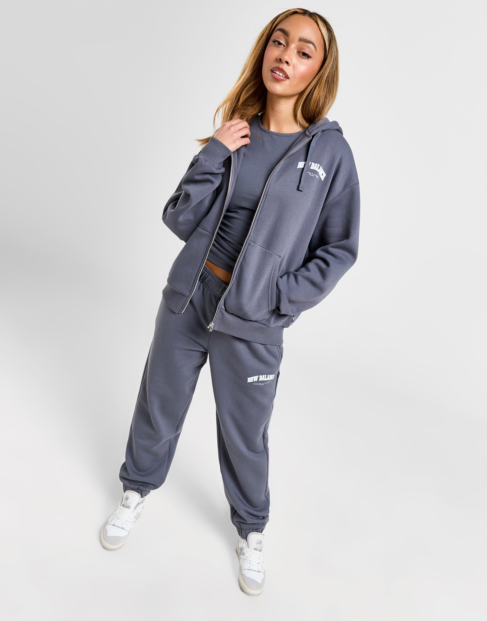 New Balance Sweat à Capuche Zippé Logo Femme