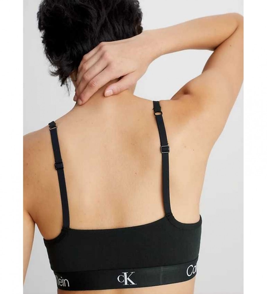 Conjunto de dois sutiãs Calvin Klein, modelo 1996, cinza e preto.