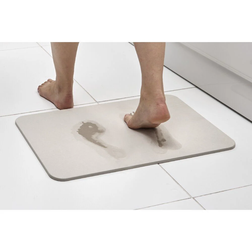 Tapis de salle de bain blanc magique