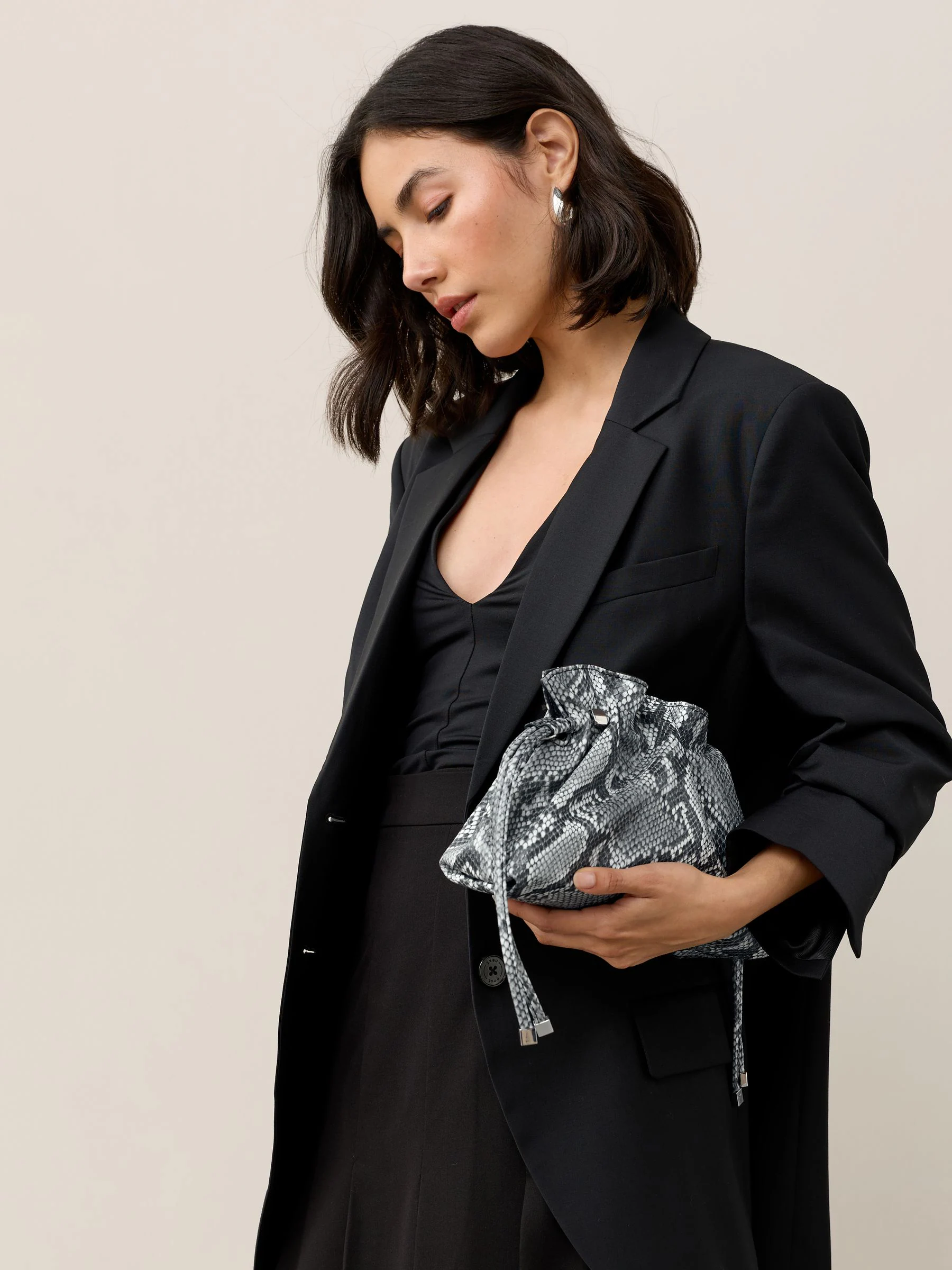 Slangenprint - Clutch met ruches