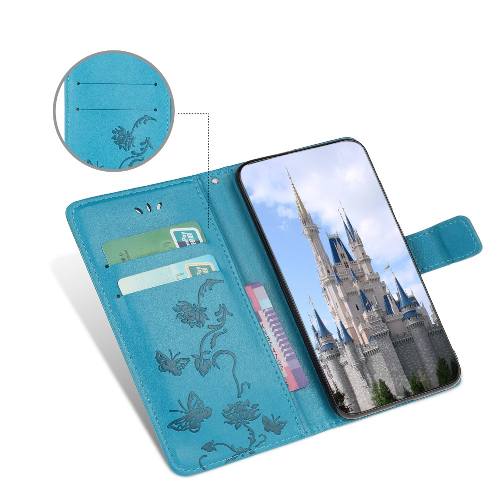 iPhone 12 / iPhone 12 Pro Leder Tasche Flip Cover Schmetterlinge und Blumen - Blau