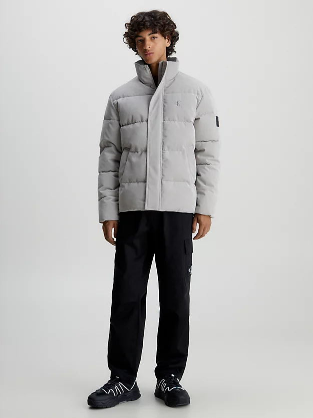 Jaqueta oversized de veludo cotelê com enchimento de plumas