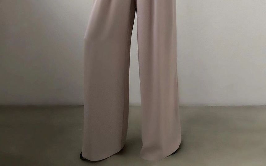 Sensarra - Spaghettibandjes jumpsuit met wijde pijpen