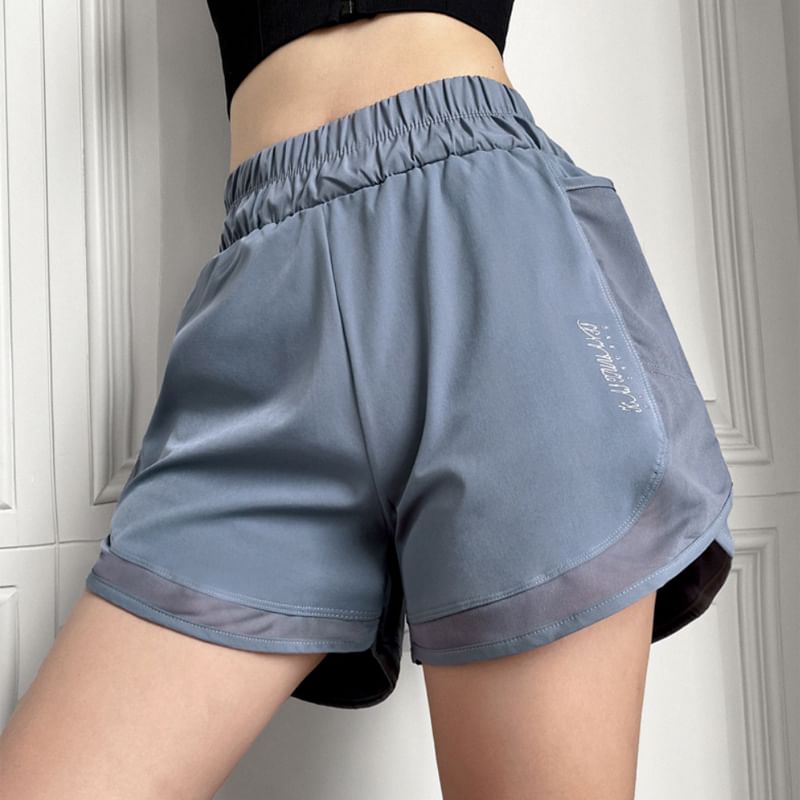 Dshe - Elastische taille, letters en split, joggingbroek