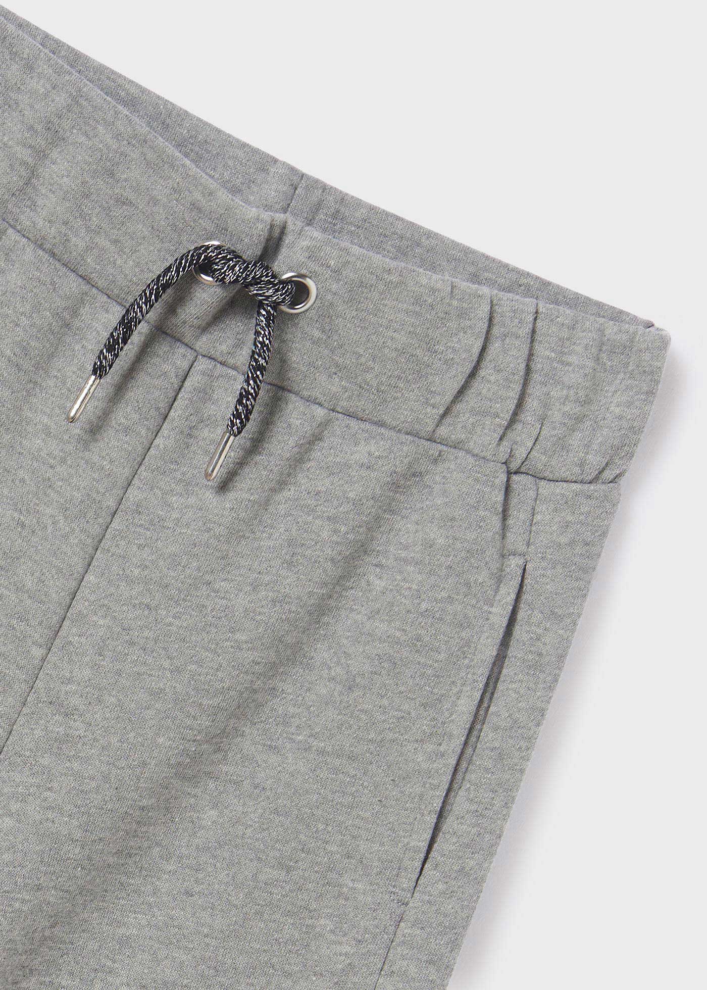 Calça esportiva feminina com tachas