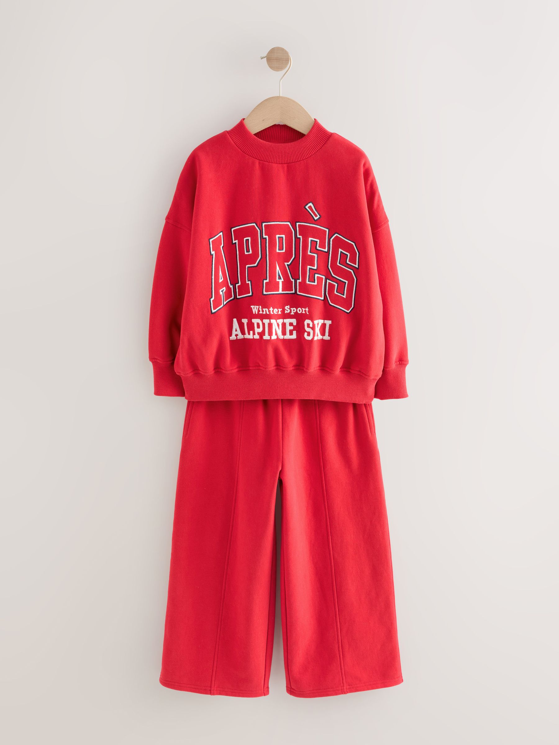 Rood met slogan - Set van sweatshirt en joggingbroek met wijde pijpen (3-16jr)