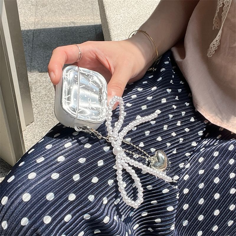Elliure - AirPods / Pro oortelefoonhoesje met strik en imitatieparels
