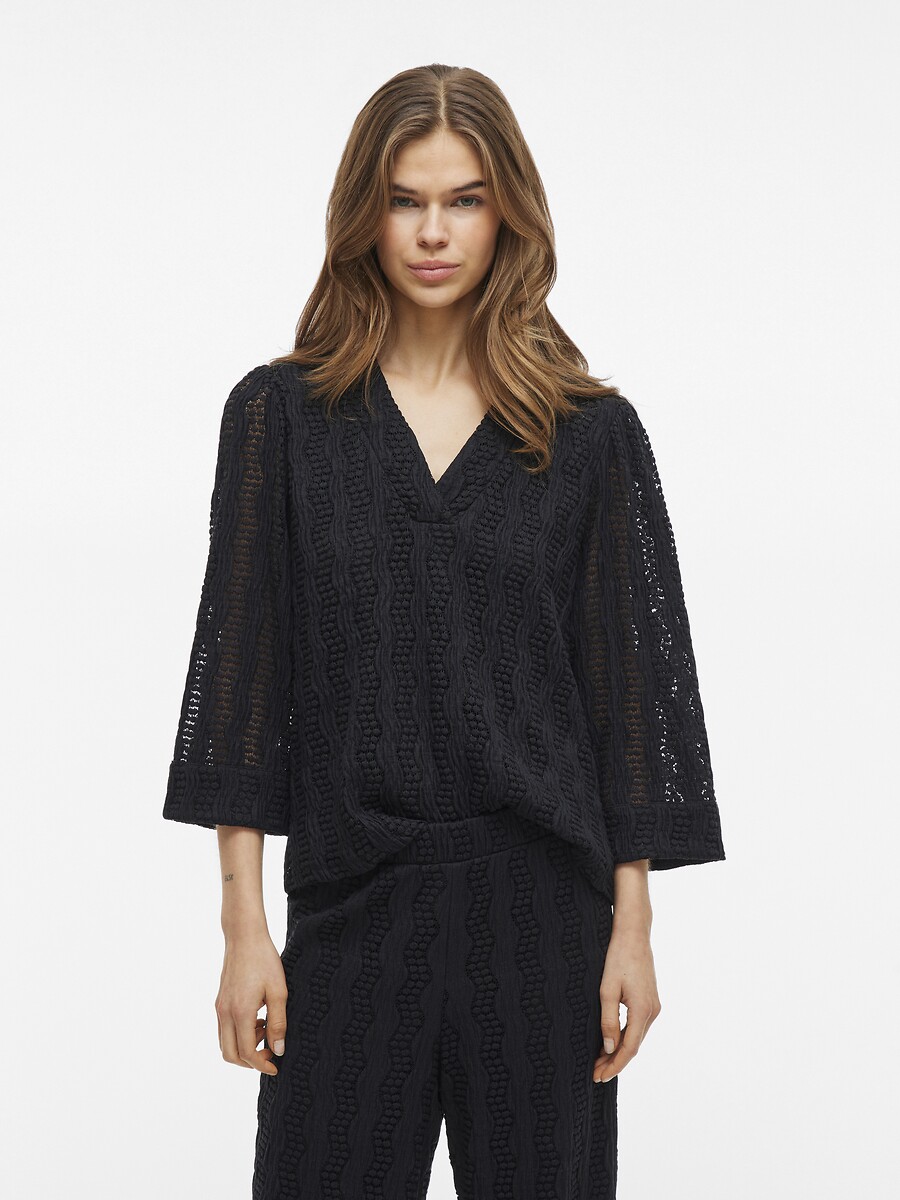 VILA<br>Blusa texturizada com decote em V