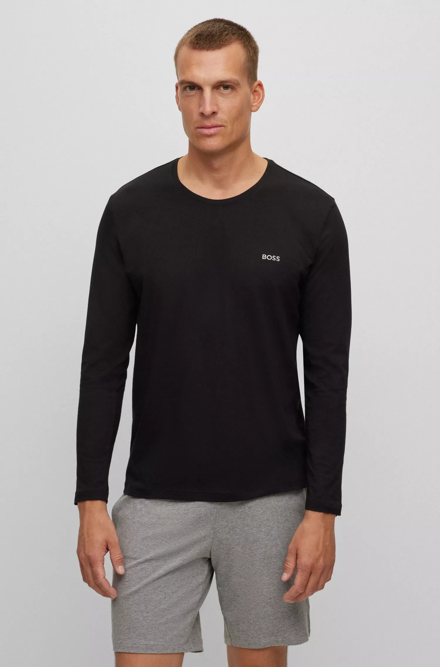 Camiseta BOSS preta de algodão stretch com modelagem regular e logotipo bordado.
