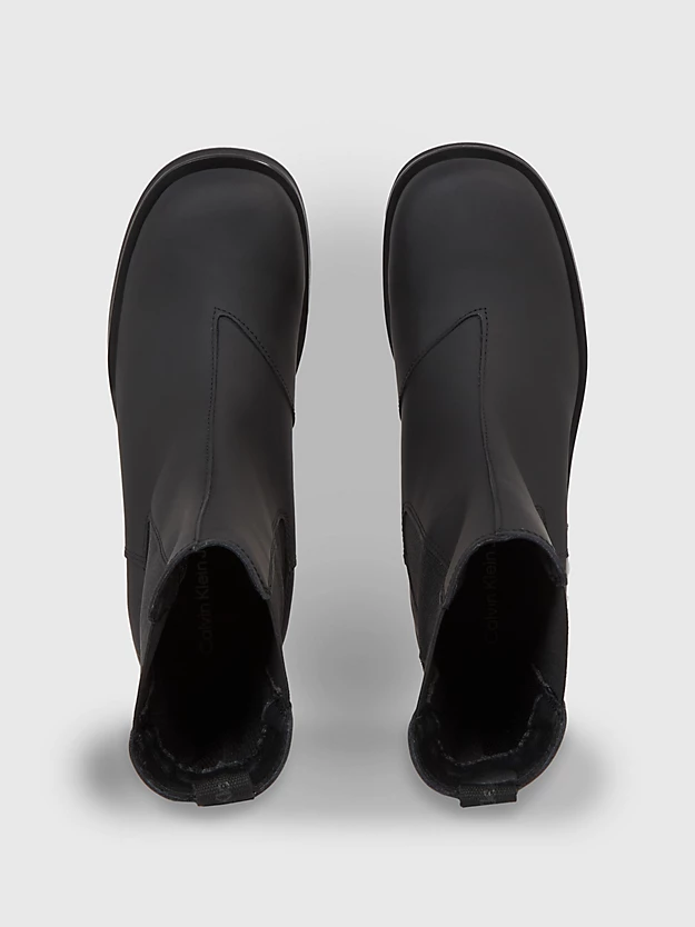 botas de couro até o tornozelo