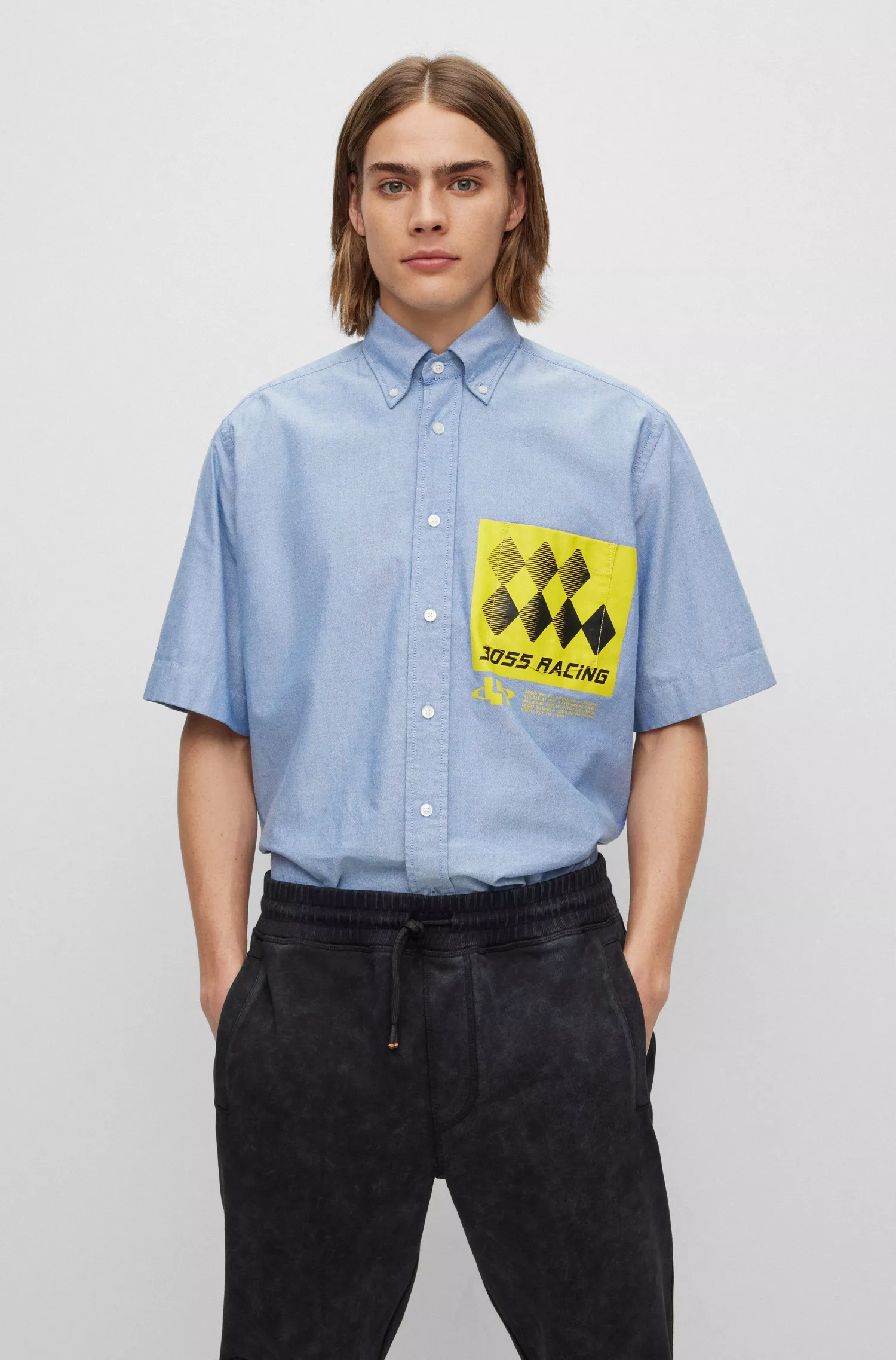 Camisa BOSS laranja de modelagem relaxada em algodão com detalhes inspirados em corridas.
