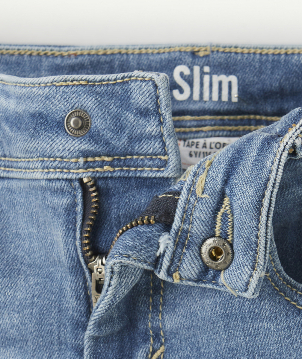 PANTALON SLIM GARÇON EN DENIM BLEU LOW IMPACT