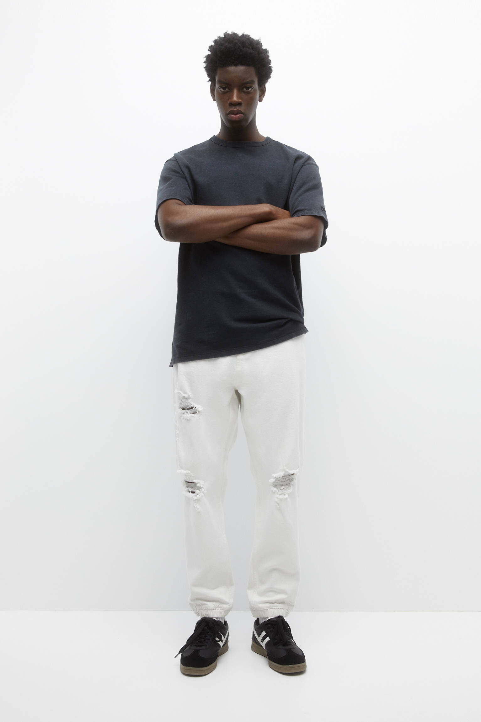 Calça jeans jogger rasgada - branca