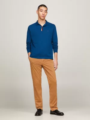 Polo de manga comprida com estampa listrada global e modelagem regular.