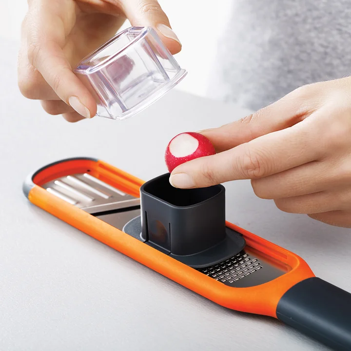 Joseph Joseph - Handi-Grate 2-in-1 Mini-Reibe und -Hobel, orange